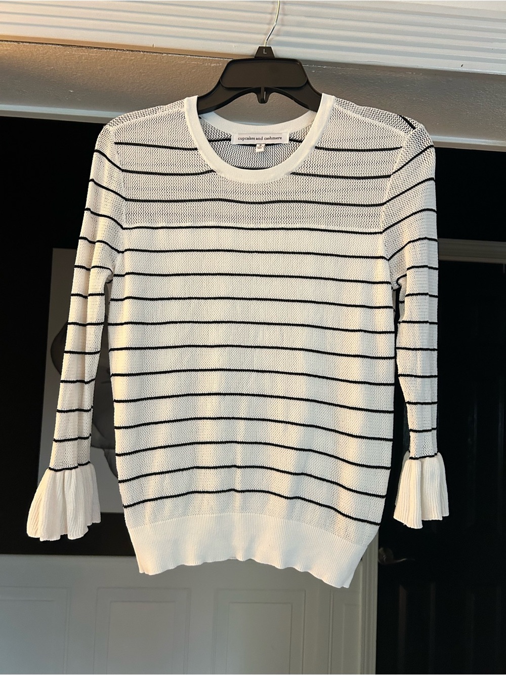 cupcakes & cashmere White and Black Striped Ruffle-Cuff Knit Top